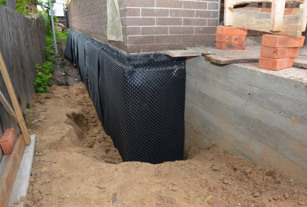 SJ Waterproofing Pros technician performing targeted Waterproofing assessment in Clarkston, MI